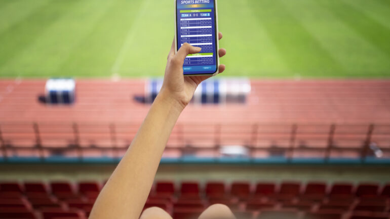 high-angle-hand-holding-smartphone
